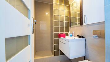 Hair dryer, towels, soap, toilet paper