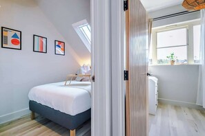 2 slaapkamers, een strijkplank/strijkijzer, wifi, beddengoed