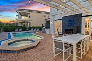 Outdoor dining - Reunion Resort Disney Ultimate Luxury Villa 6k+ Sq Ft (Kissimmee)