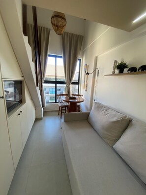 Deluxe Duplex, Pool View | Living area | Flat-screen TV - Duplex Vista Piscina by La Playa (Ipojuca)