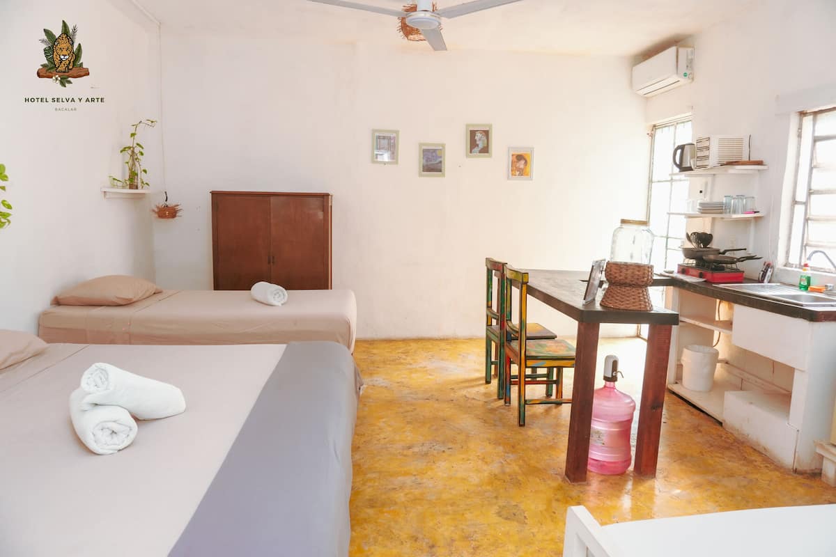 Family Bungalow, Multiple Beds, Kitchen, Garden View | 1 bedroom, free minibar items, iron/ironing board, free WiFi