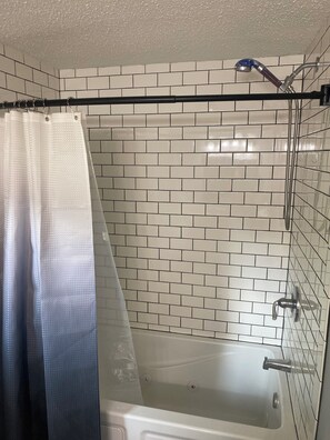 Shower, jetted tub, hair dryer, bidet