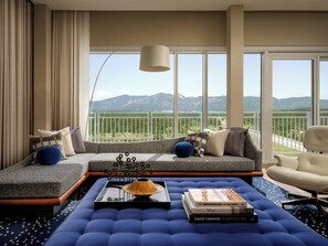 Suite (Superintendent) | Living area | 55-inch Smart TV with satellite channels, table football, ping pong - Hotel Polaris (Colorado Springs)