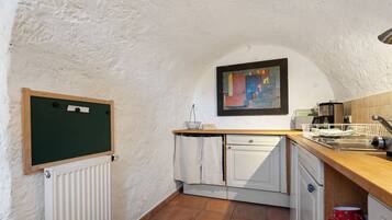 Fridge, coffee/tea maker, electric kettle, toaster