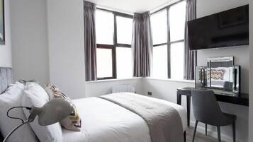 1 Schlafzimmer, BĂŒgeleisen/BĂŒgelbrett, kostenloses WLAN, BettwĂ€sche