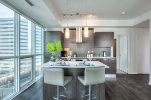 Luxury Suite, 2 Bedrooms, City View | In-room dining