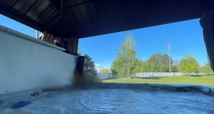 Spacious 5-bedroom house with hot tub, WiFi, and 80 inch big screen TV