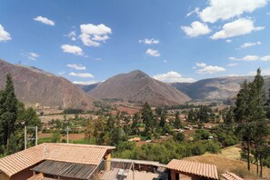 A mountainous landscape with a village in the valley. - Catahuasi by Wynwood House (Huayllabamba)