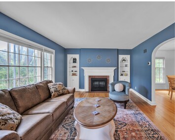 Cozy living room with a working fireplace. Pull-out sofa and incredible comfort. All new furniture and decor throughout the home.
