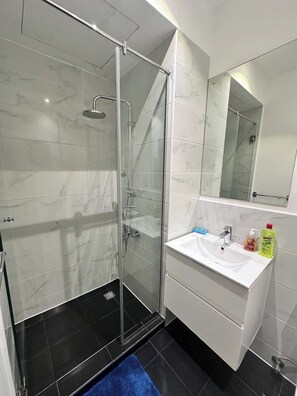 Hair dryer, towels, soap, toilet paper
