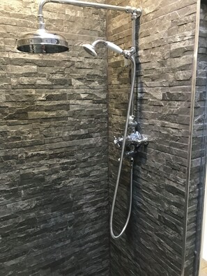 Shower, hair dryer, towels, soap