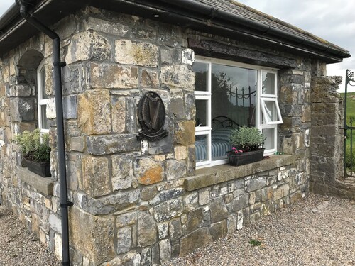 Traditional stone cottage on the river in charming Cashel, Tipperary