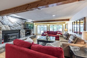 Smart TV, fireplace, foosball, books