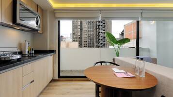 Apartment, Balcony (03) | Living area | 40-inch Smart TV with cable channels