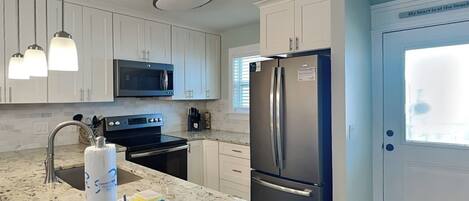 Resortwoning, Meerdere bedden, balkon, uitzicht op tuin (Villa Chateau #10) | Privékeuken | Een koelkast, een microgolfoven, een oven, een kookplaat