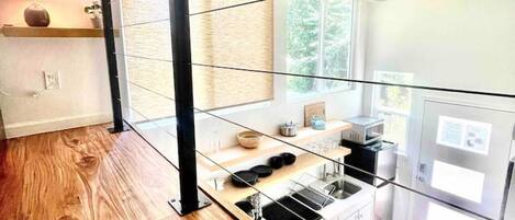 Fridge, microwave, stovetop, coffee/tea maker