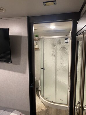Shower, towels, soap, shampoo