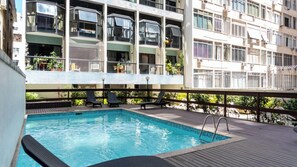 Outdoor pool, pool umbrellas, pool loungers