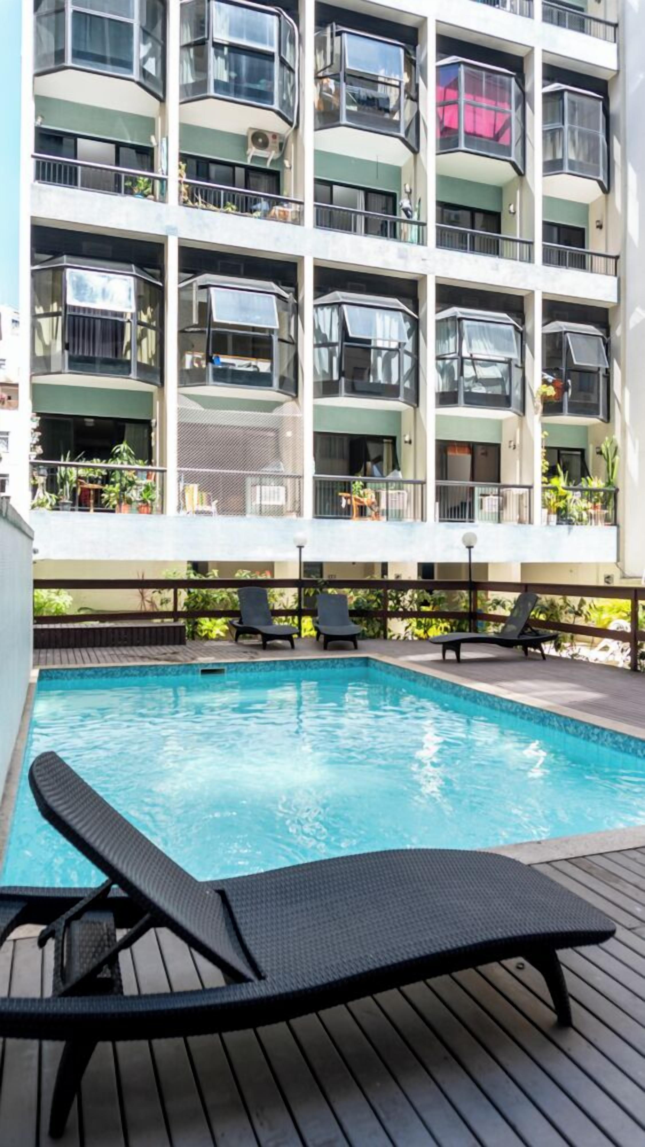 Outdoor pool, pool umbrellas, pool loungers