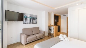 1 dormitorio, tabla de planchar con plancha, cuna de viaje y wifi