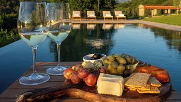 Outdoor pool, open 9:00 AM to 9:00 PM, pool umbrellas, sun loungers