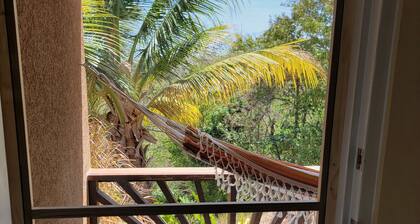 Charming 2-bedroom hideaway near Cabier, full kitchen and air-conditioned rooms.