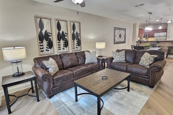 Comfortable living room with mountain-inspired decor and room to unwind.
