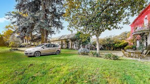 A car parked in a grassy area with a building in the background. - Pet friendly home in Chabris with WiFi (Chabris)