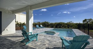 A heated pool - Beachfront Escape with Pool, Spa & Massage Chair | Newly Built (Palm Coast)
