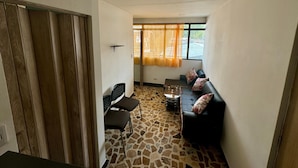Apartamento familiar, vistas a la ciudad | Zona de estar
