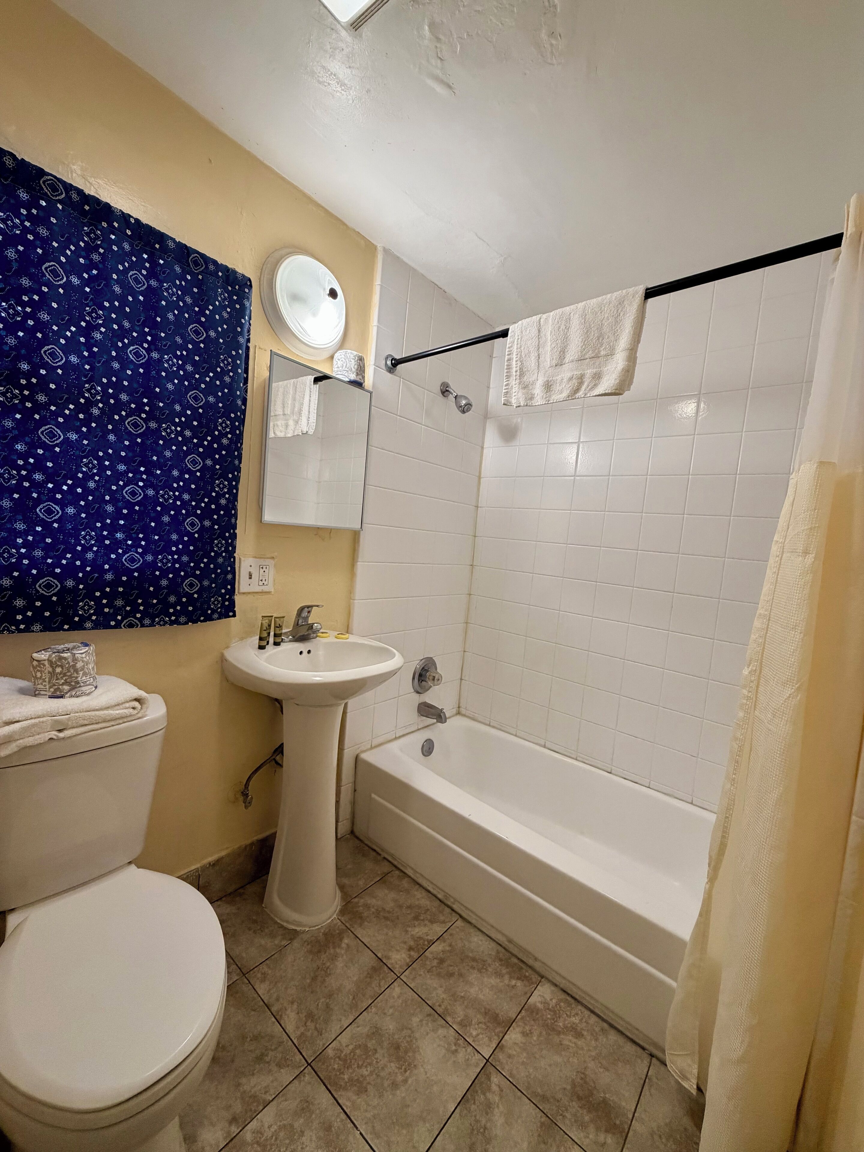 Shower, towels, soap, shampoo