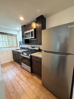 Superior Double Room, Garden View | Private kitchen | Mini-fridge, microwave