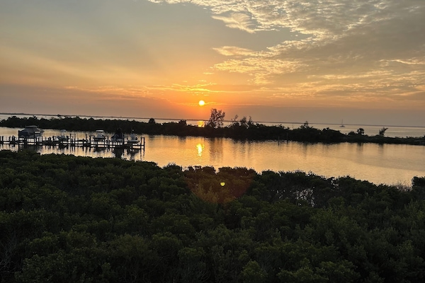 View from the master bedroom and screened in lanai.