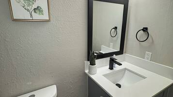 Hair dryer, towels, soap, shampoo