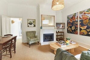 TV, fireplace, books, stereo