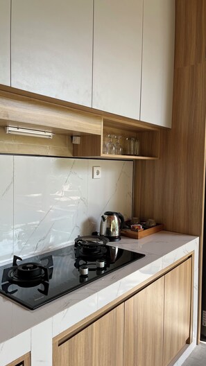 Family Villa, 1 Bedroom, Patio, Pool View | Private kitchenette | Fridge, cookware/dishes/utensils, dining tables
