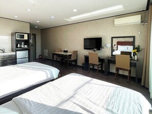 Chambre Deluxe avec lits jumeaux, balcon, vue jardin