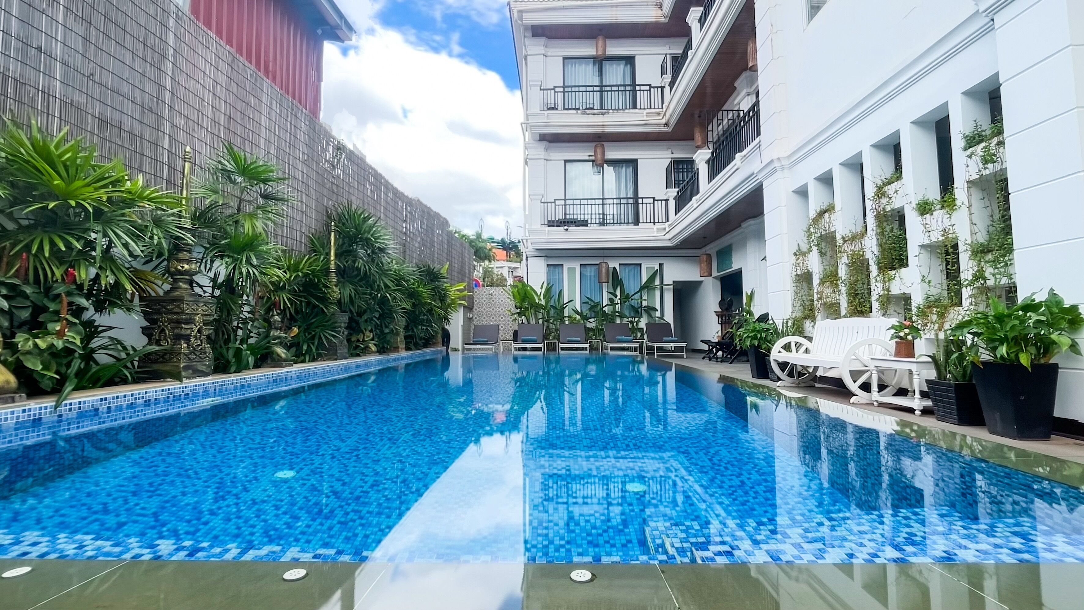 Outdoor pool, open 9:00 AM to 9:00 PM, free cabanas, pool umbrellas