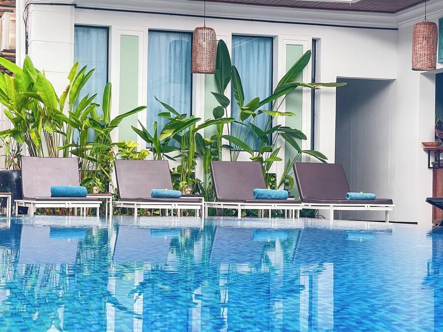 Outdoor pool, open 9:00 AM to 9:00 PM, free cabanas, pool umbrellas