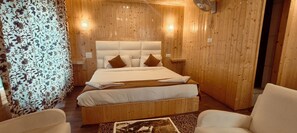 Premium Room | Egyptian cotton sheets, premium bedding, down comforters - Brown Palace  (Anantnag)