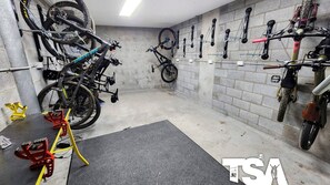 Prepare for your next adventure with a space equipped with bicycles, shoes, and climbing gear.