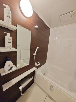 Apartamento clássico | Banheiro | Chinelos 