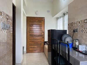 Cookware/dishes/utensils, ice maker - Roof top One Bed Fully Furnished Apartment with Kitchen, small Living & Bathroom (BASHUNDHARA)