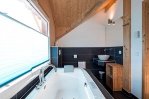 Shower, jetted tub, hair dryer, bidet