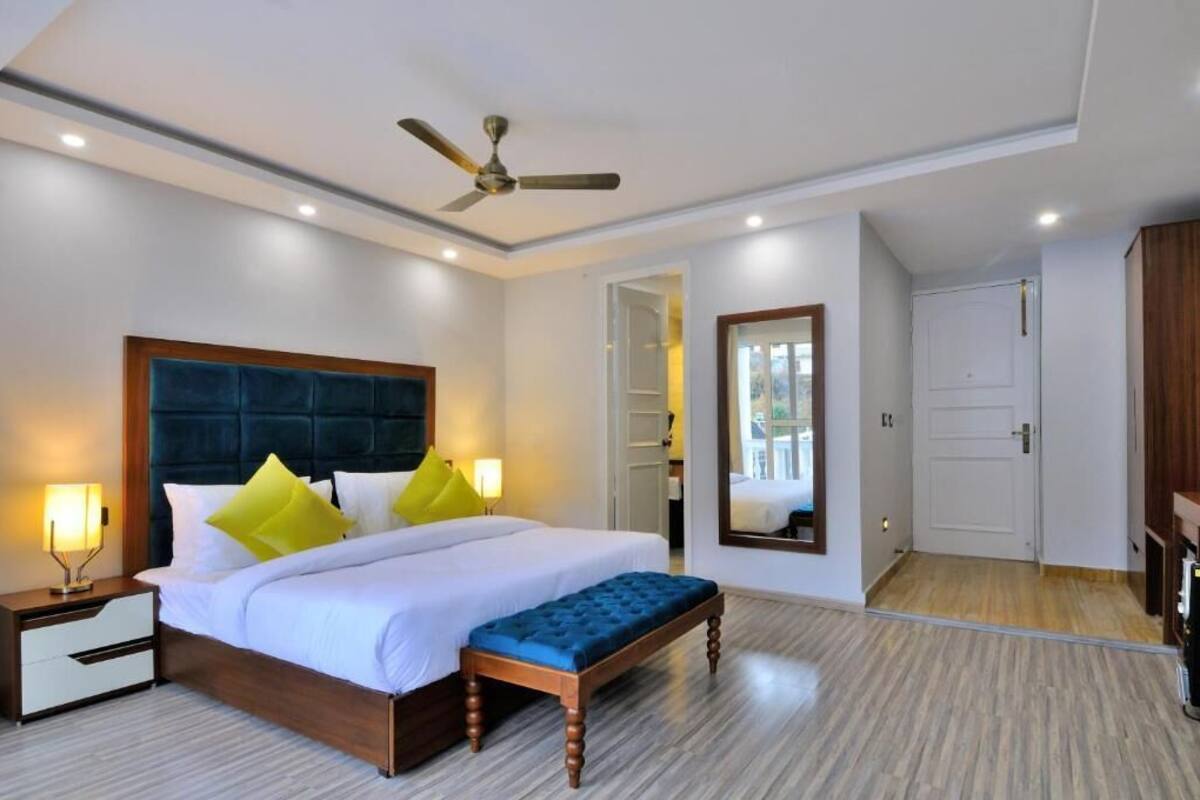 Deluxe Double Room, Balcony, Garden View | In-room safe, desk, laptop workspace, iron/ironing board