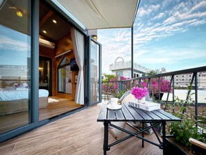 Dreibettzimmer, Balkon