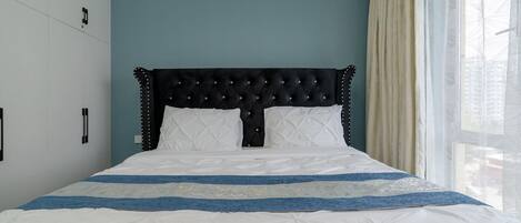 1 bedroom, premium bedding, memory-foam beds, blackout curtains