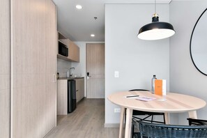 Fridge, microwave, stovetop, coffee/tea maker