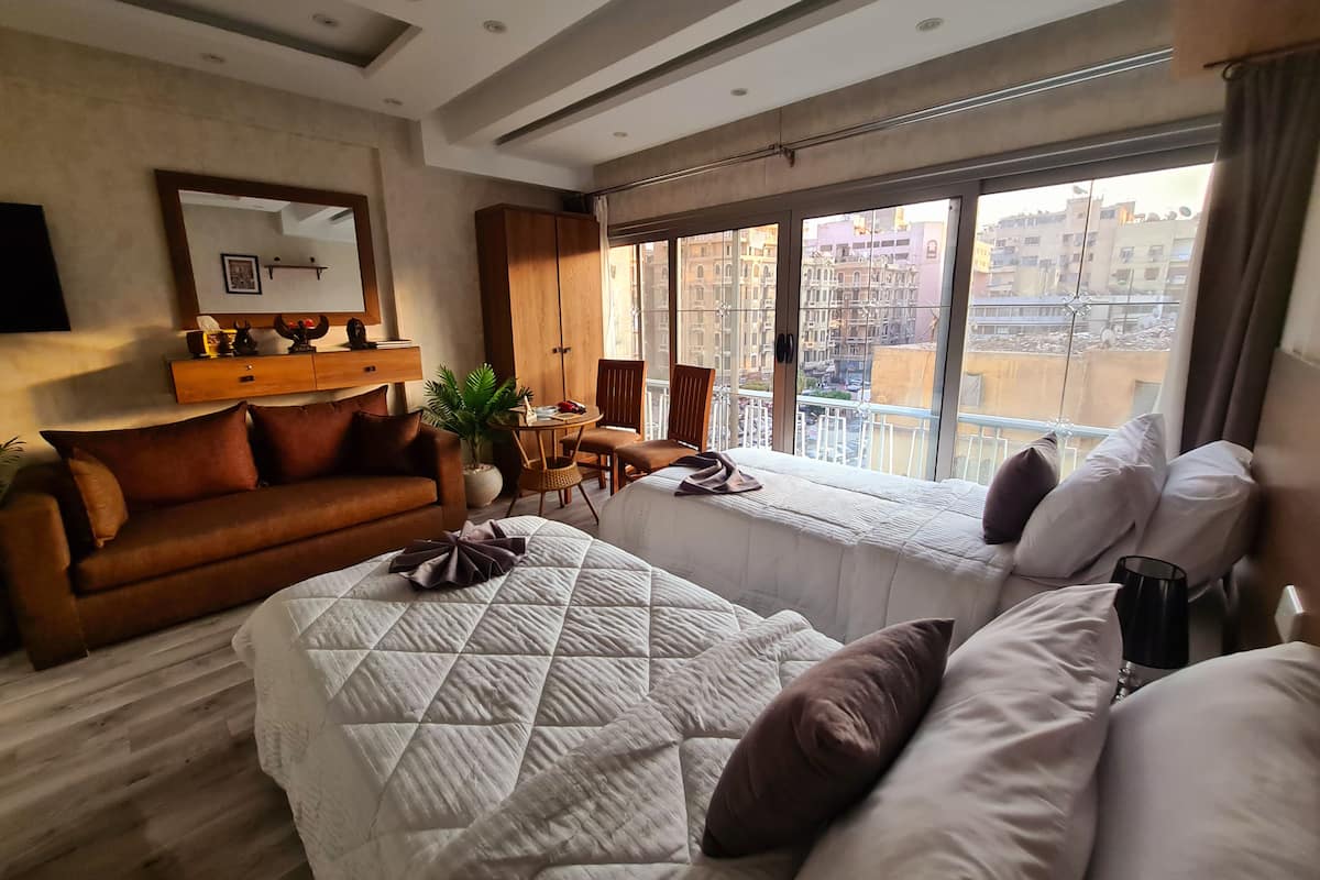 Superior kamer, 1 twee- of 2 eenpersoonsbedden, kitchenette, uitzicht op stad | Lakens van Egyptisch katoen, luxe beddengoed, donzen dekbedden