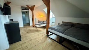 Romantic Studio Suite, 1 Queen Bed, City View | Minibar, blackout drapes, soundproofing, free WiFi - Family Apartments Černice (Mojné)